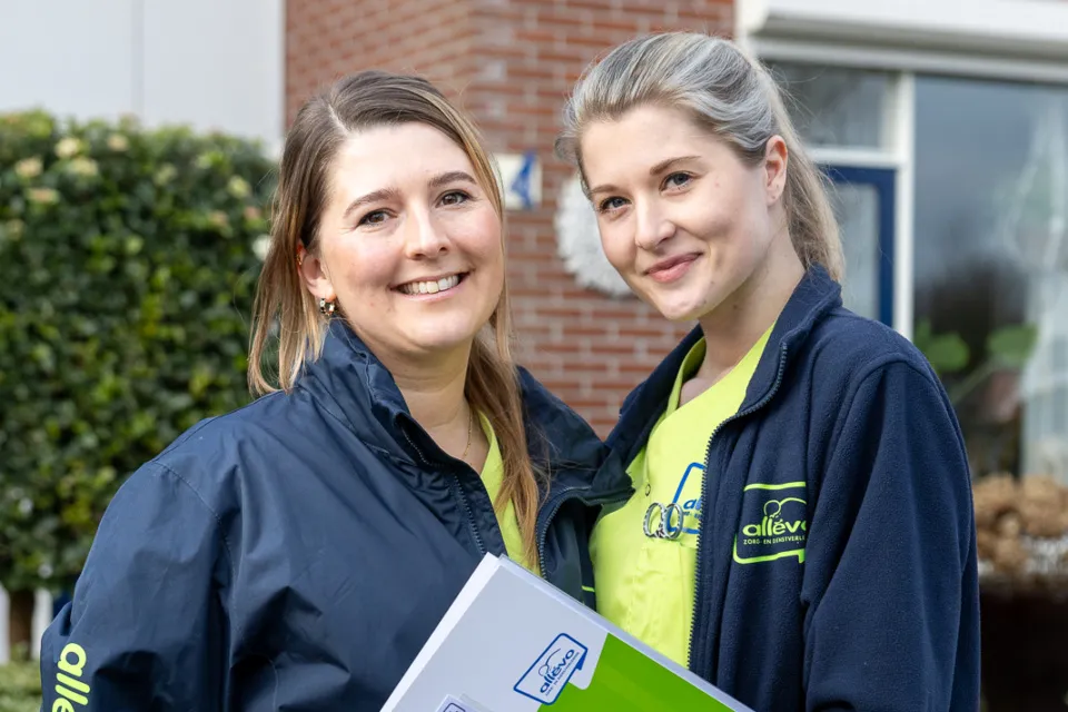 twee collega's zorg aan huis